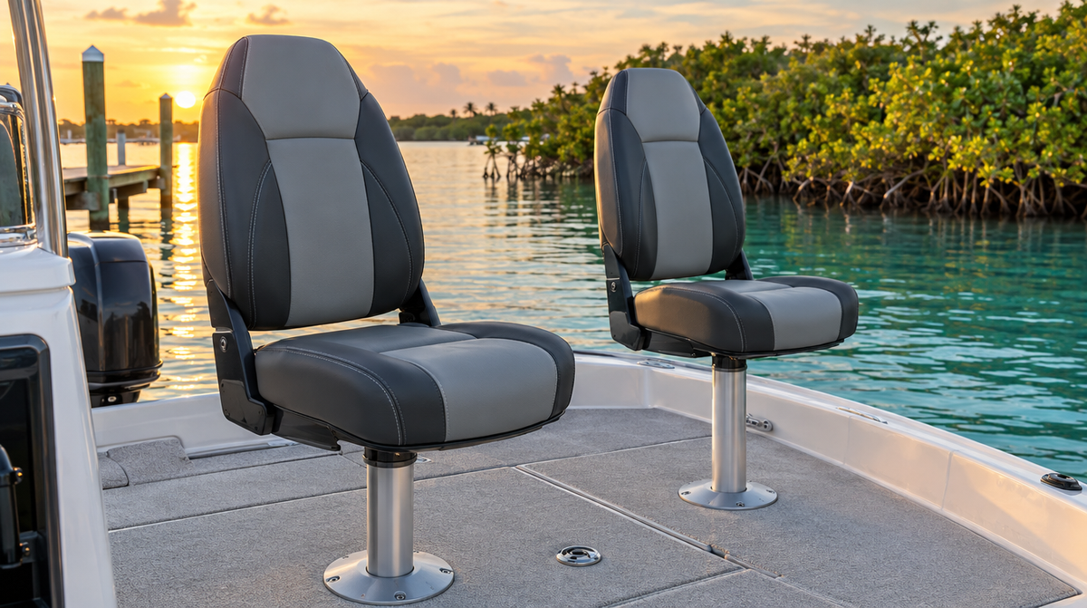 Two high-back folding fishing seats on pedestals on a boat casting deck